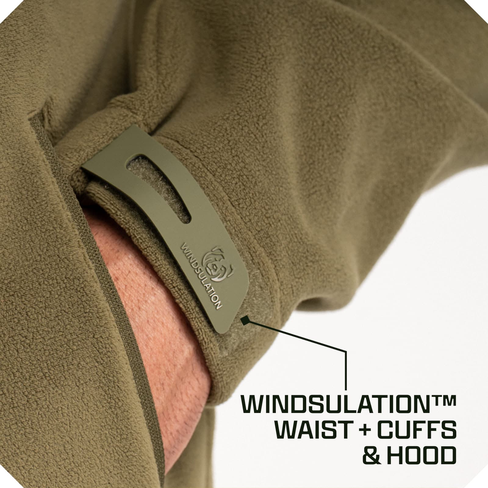 Close-up of olive fleece jacket cuff with Windsulation branded tab for wind protection at waist, cuffs, and hood
