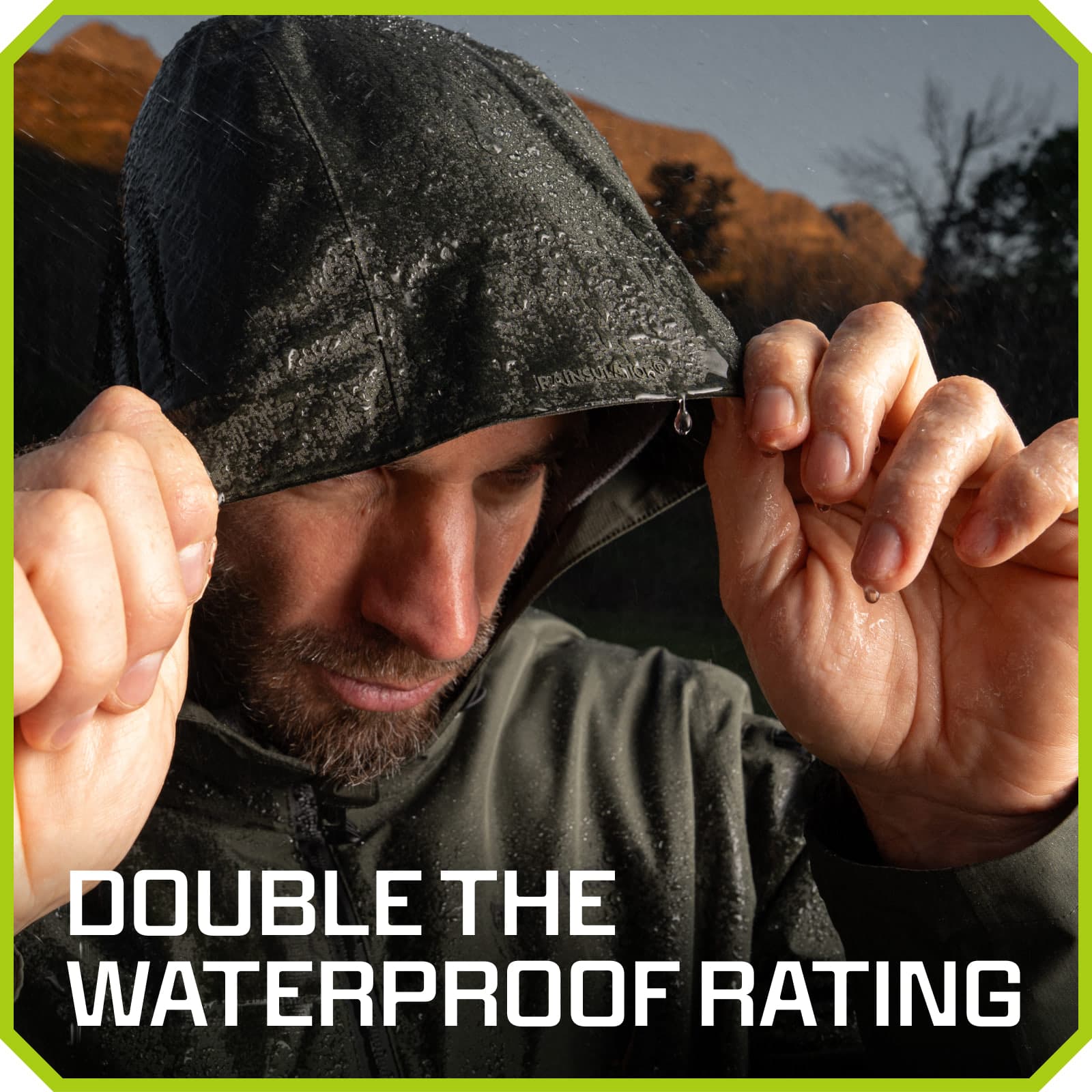 Man pulling up jacket hood in rain, water beading off waterproof fabric, double waterproof rating